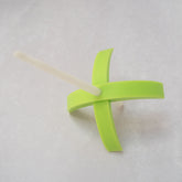 A 3d-printed Turkish drop spindle in lime green